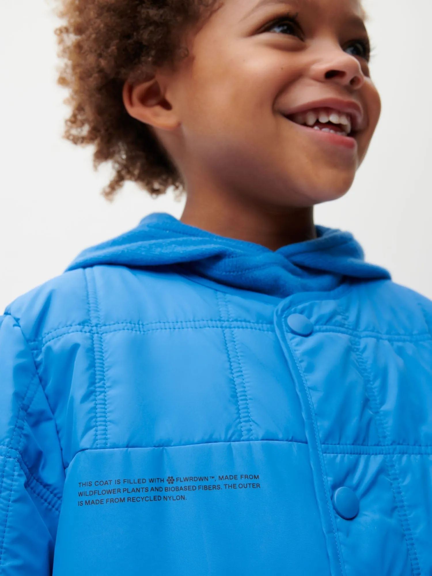 Archive Kid’s Flower-Warmth Quilted Collarless Jacket—cerulean blue